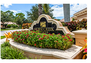 Horse Creek Estates Community entry sign located by the Palm River in Naples, Florida