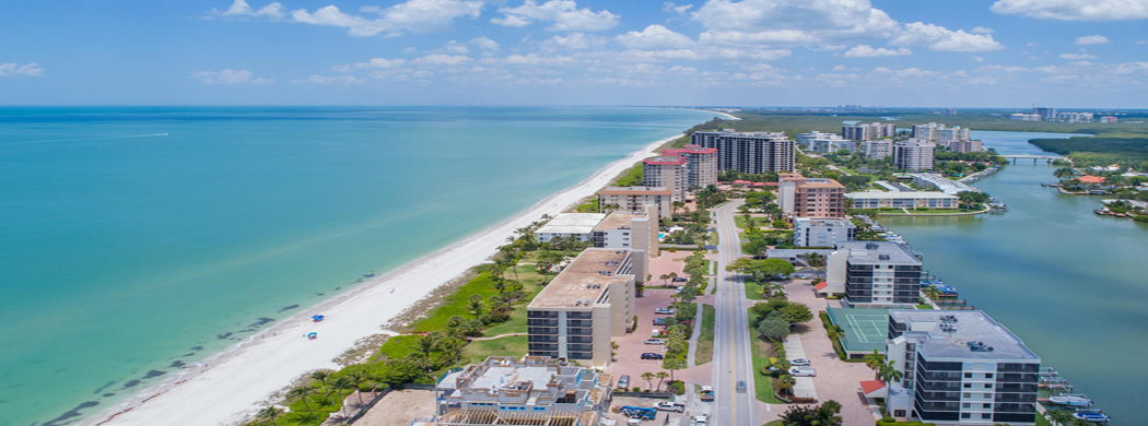 Vanderbilt Beach in Naples, Florida Aerial | Janine Monfort - Premier Sotheby's International Realty